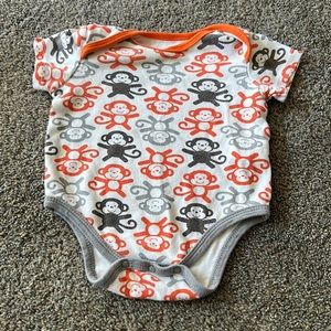 Welcome to the world size 0-3 months white with orange grey and brown monkeys